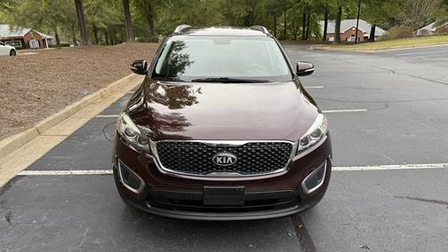 Red 2016 Kia Sorento LX