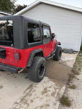 Red 2003 Jeep Wrangler SE