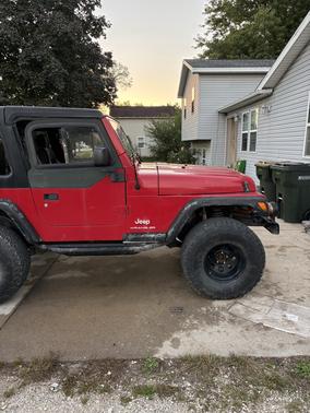 Red 2003 Jeep Wrangler SE