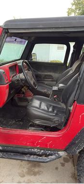 Red 2003 Jeep Wrangler SE