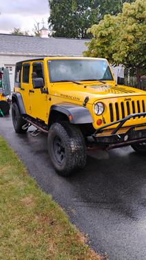 Yellow 2009 Jeep Wrangler Unlimited Rubicon