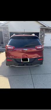 Red 2015 Jeep Cherokee Limited