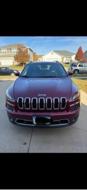 Red 2015 Jeep Cherokee Limited