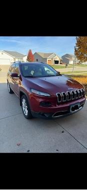 Red 2015 Jeep Cherokee Limited