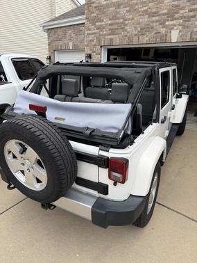 White 2010 Jeep Wrangler Unlimited Sahara