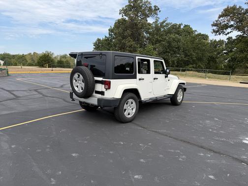 White 2010 Jeep Wrangler Unlimited Sahara