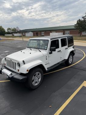 White 2010 Jeep Wrangler Unlimited Sahara