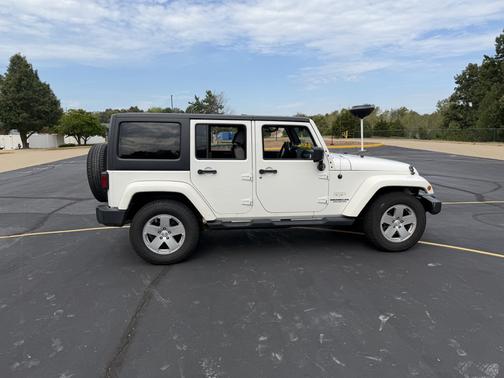 White 2010 Jeep Wrangler Unlimited Sahara