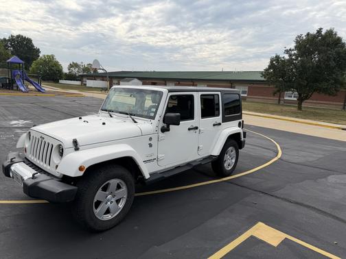 White 2010 Jeep Wrangler Unlimited Sahara