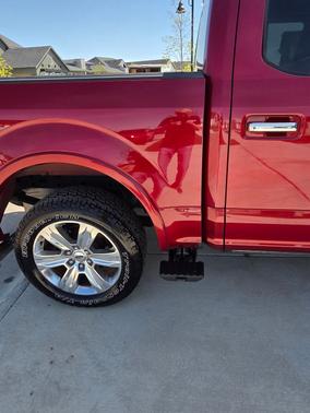 Red 2015 Ford F-150 Platinum