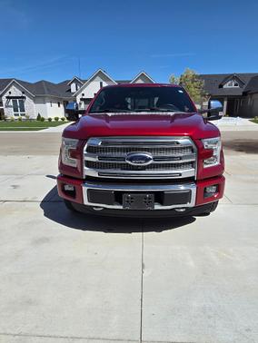Red 2015 Ford F-150 Platinum