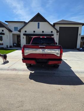 Red 2015 Ford F-150 Platinum