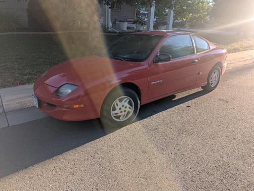 Red 1999 Pontiac Sunfire SE
