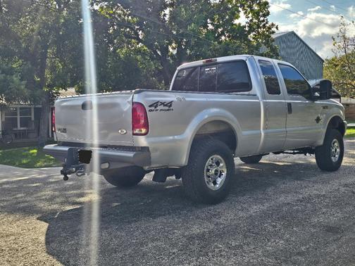 Silver 2000 Ford F-250 XLT SuperCab Super Duty