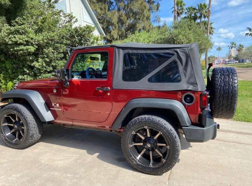 Red 2009 Jeep Wrangler X