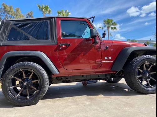 Red 2009 Jeep Wrangler X