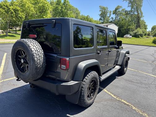 Gray 2016 Jeep Wrangler Unlimited Sport