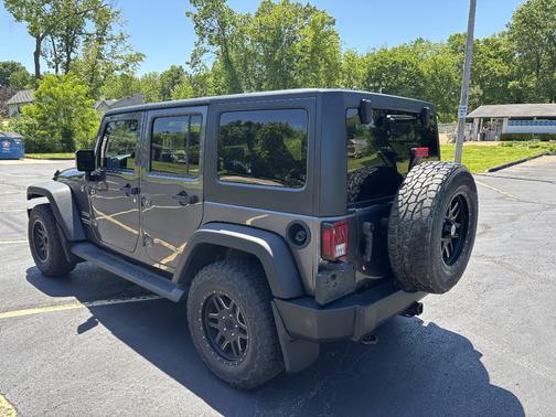 Gray 2016 Jeep Wrangler Unlimited Sport