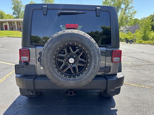 Gray 2016 Jeep Wrangler Unlimited Sport