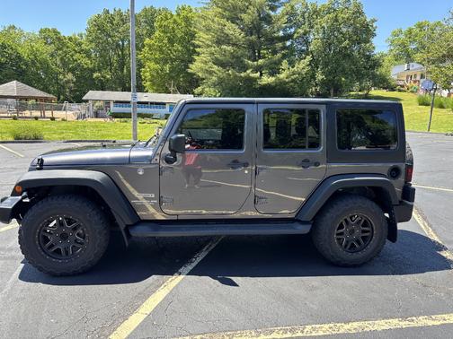 Gray 2016 Jeep Wrangler Unlimited Sport