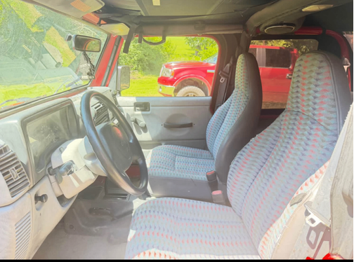Red 1997 Jeep Wrangler SE