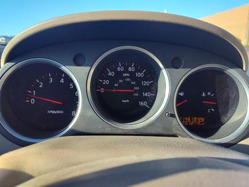Red 2007 Nissan Maxima SE