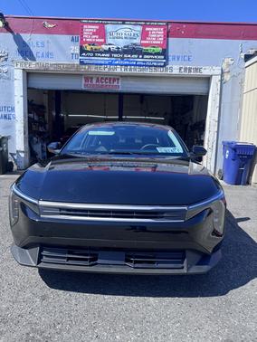 Black 2025 Kia K4 LXS