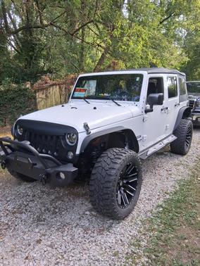 White 2016 Jeep Wrangler Unlimited Sport
