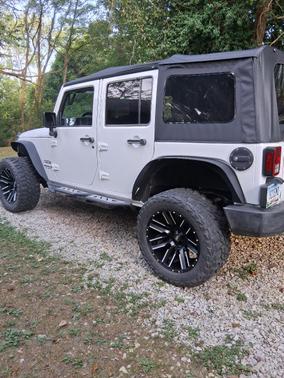 White 2016 Jeep Wrangler Unlimited Sport