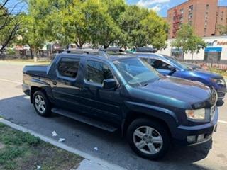 Blue 2010 Honda Ridgeline RTL
