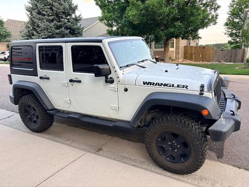 White 2016 Jeep Wrangler Unlimited Sport