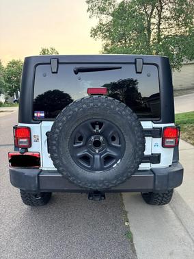 White 2016 Jeep Wrangler Unlimited Sport