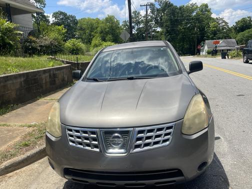 Brown 2010 Nissan Rogue S