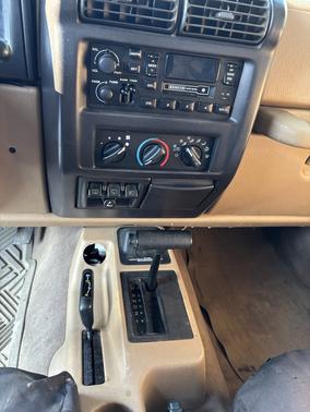Beige 1999 Jeep Wrangler Sahara