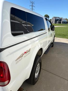 White 1999 Ford F-250 Lariat SuperCab Super Duty