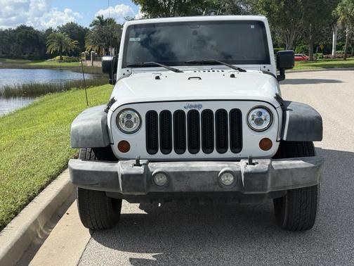 White 2011 Jeep Wrangler Unlimited Sport