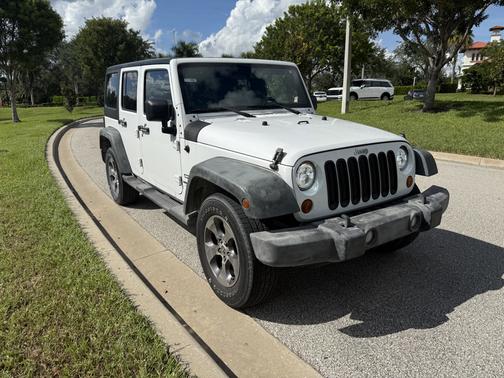 White 2011 Jeep Wrangler Unlimited Sport