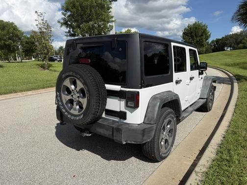 White 2011 Jeep Wrangler Unlimited Sport