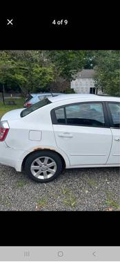 White 2009 Nissan Sentra 2.0 SL