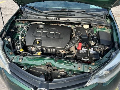 Green 2014 Toyota Corolla LE