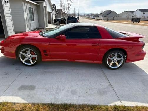 Red 1999 Pontiac Firebird Trans Am