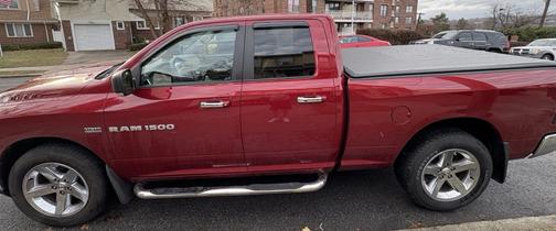 Red 2012 RAM 1500 Big Horn