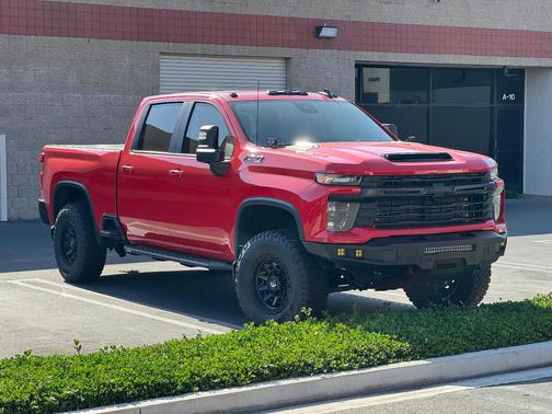 Red 2025 Chevrolet Silverado 2500 LT