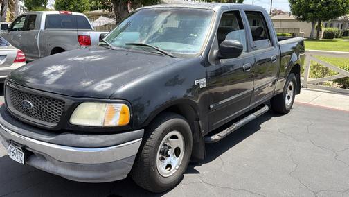 Black 2003 Ford F-150 XLT SuperCrew