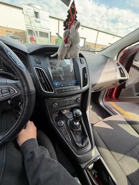 Red 2015 Ford Focus SE
