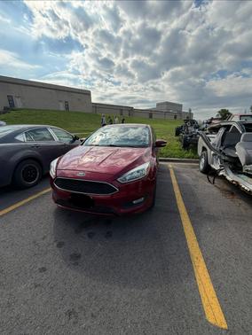 Red 2015 Ford Focus SE