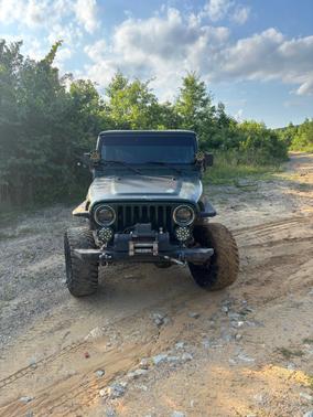 Green 1997 Jeep Wrangler Sport