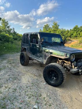 Green 1997 Jeep Wrangler Sport