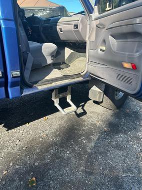 Blue 1995 Ford F-250 XL H/D