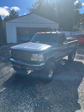 Blue 1995 Ford F-250 XL H/D